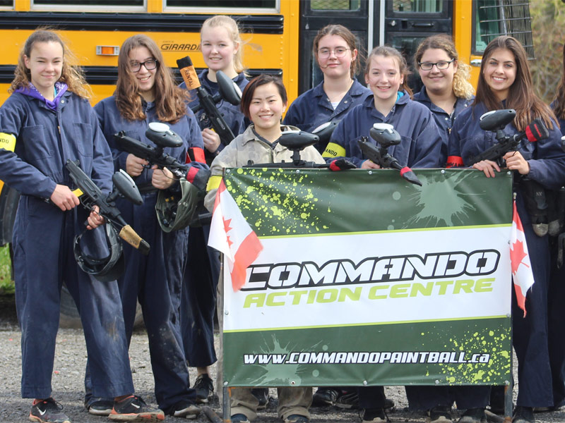 group of girls at commando paintball
